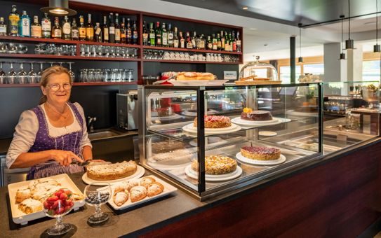 Christina dietro al balcone dei dolci