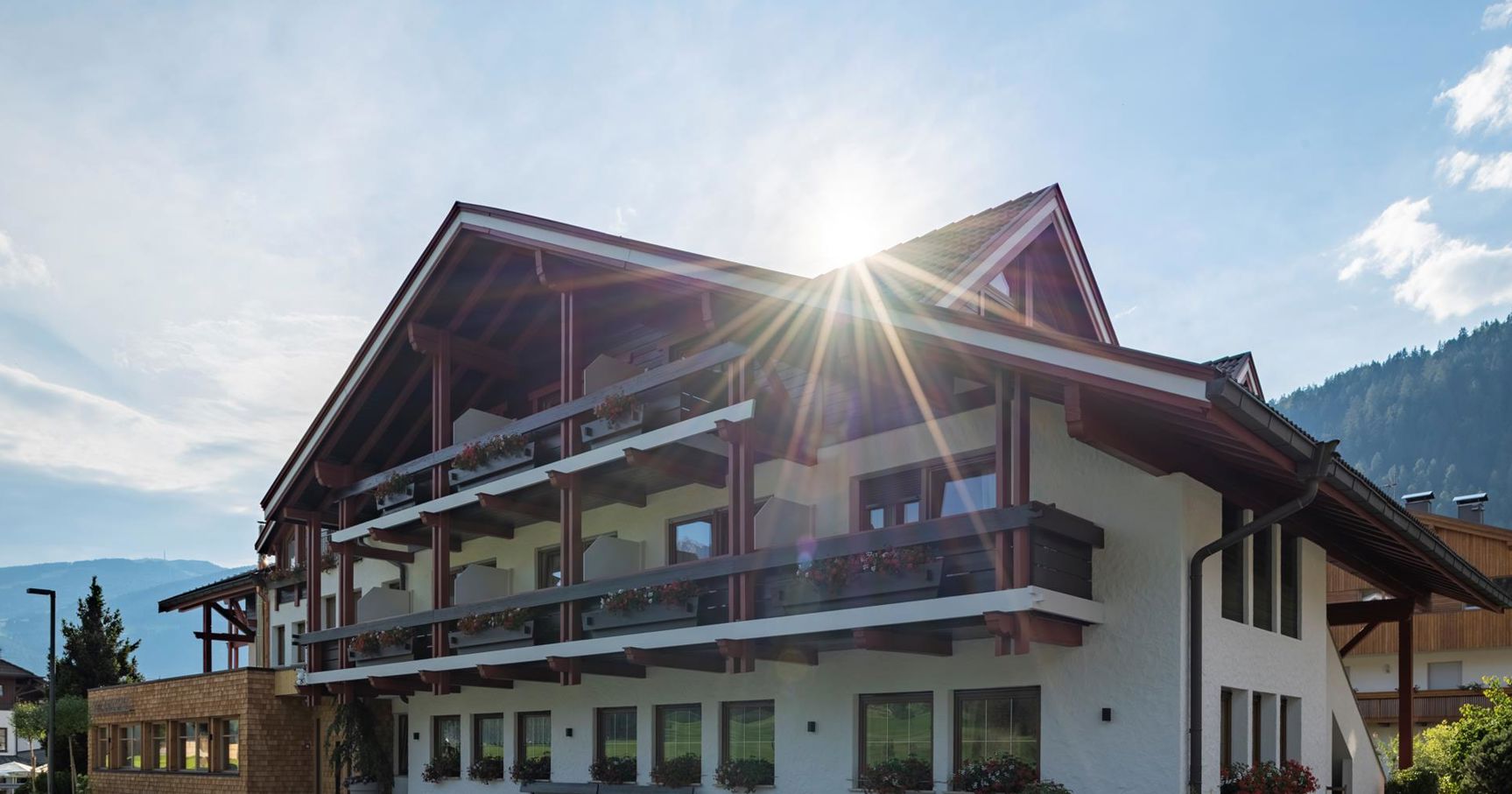 The sun is shining above Hotel Brunnerhof